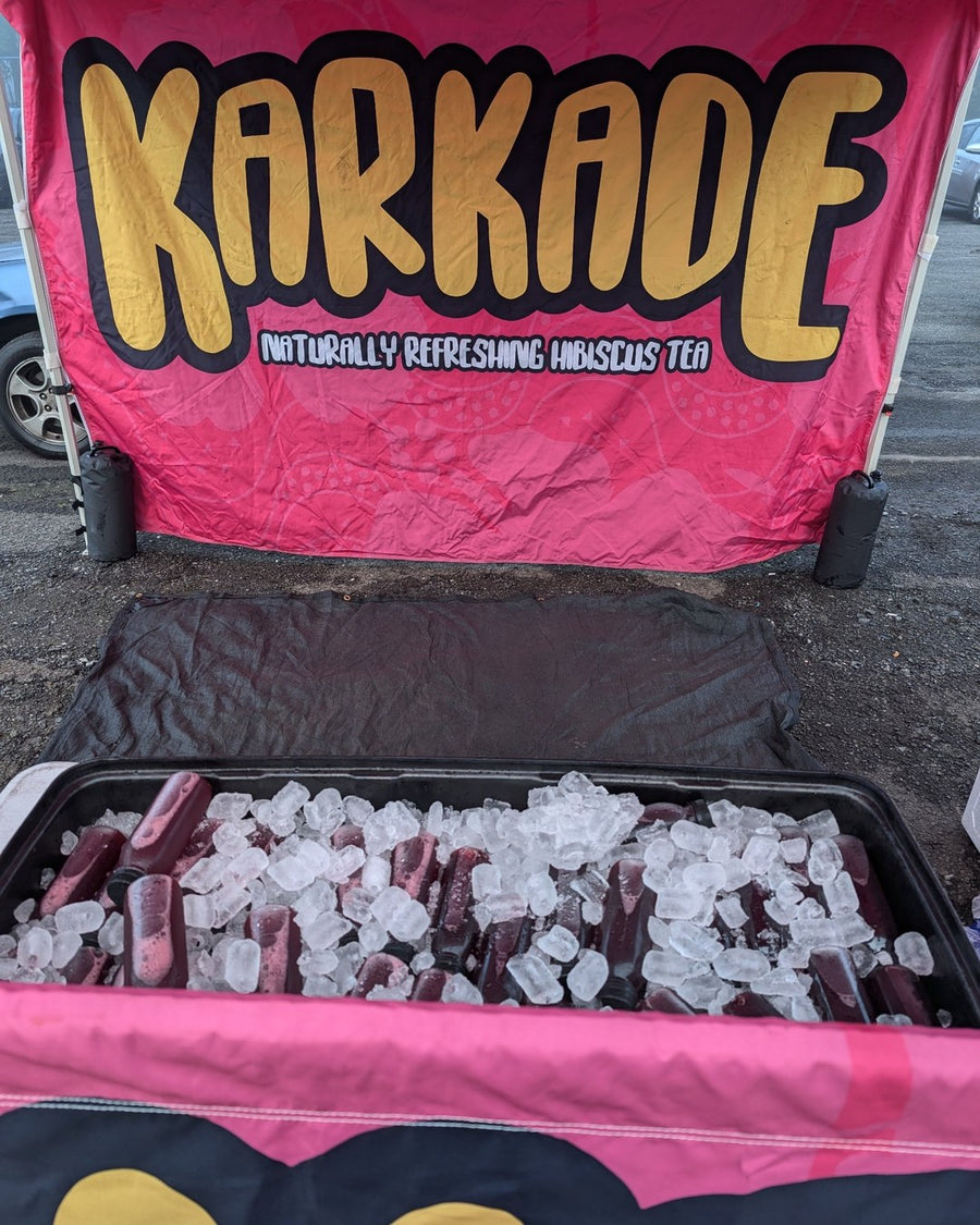 The Karkade stall at Blacktown Markets with bottles on ice